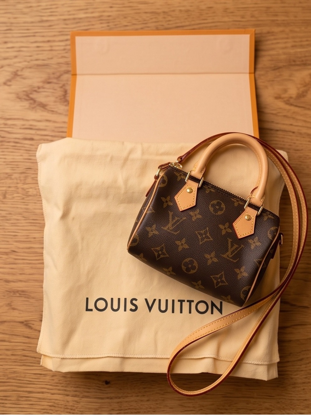 Louis Vuitton Brown Monogram NANO Speedy with Tan Leather